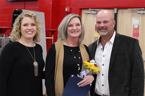 Stacy Morrison (center) with Weaver Elementary School Principal Summer Davis (left) and Board President Tobi Burt 
